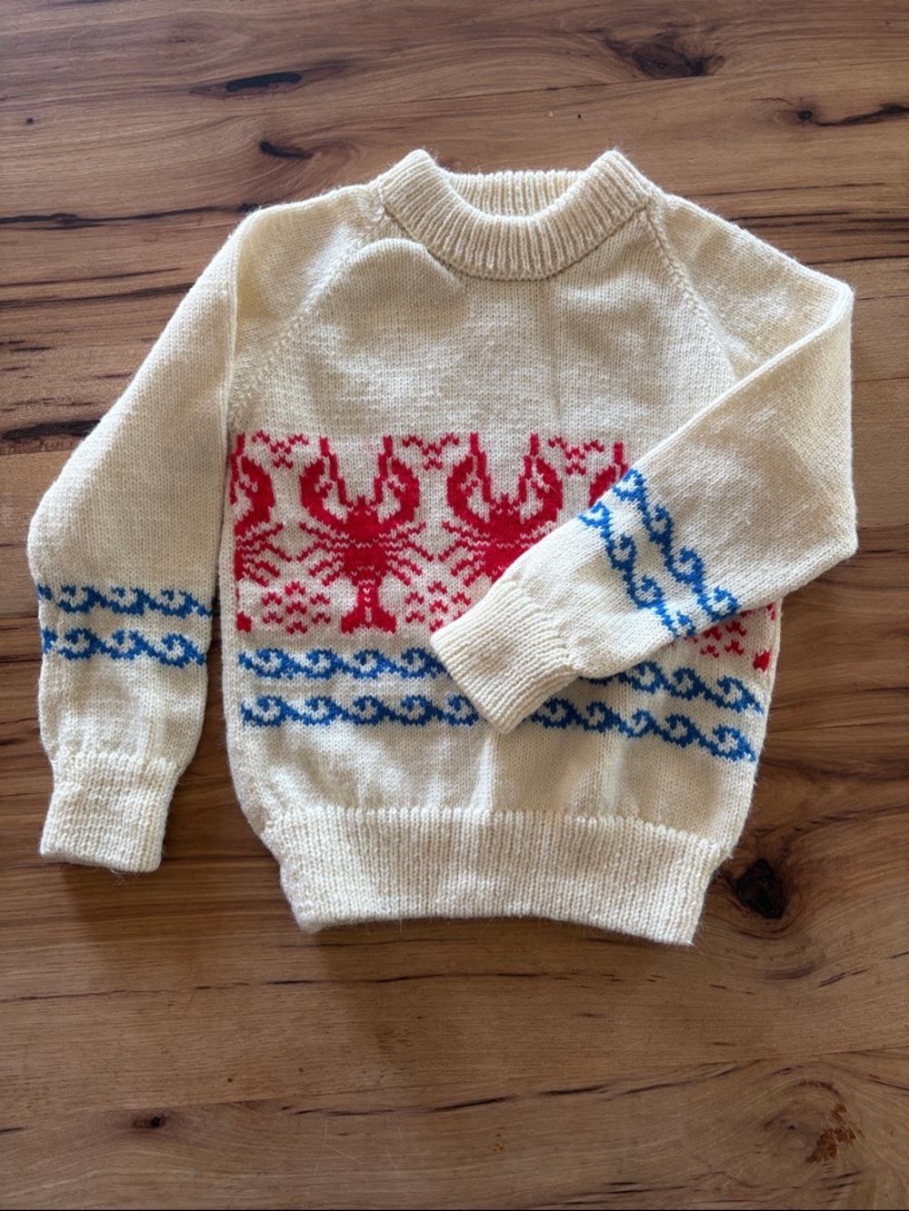 Nautical-Inspired Cream Knit Sweater with Red Lobster Motif